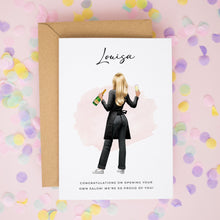 A greeting card with a woman holding a bottle of champagne and a glass, surrounded by confetti on a pink background.