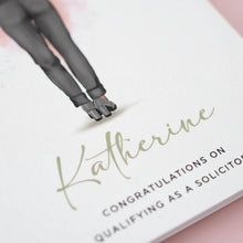 a close-up of a person's legs wearing high heels, with the name 'Katherine' written below them.