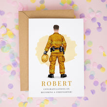 a card with a firefighter illustration and the name "ROBERT" written below it.
