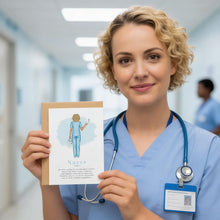 A smiling woman in a blue medical uniform holding a card with an illustration of a nurse.