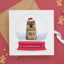 a card with a dog inside of a snow globe