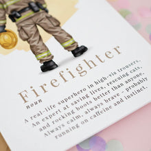 A firefighter in uniform standing on a white background.