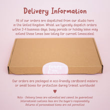 a cardboard box with a sticker that says delivery information