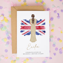 A greeting card with a woman in a long dress standing in front of a Union Jack flag, surrounded by confetti.