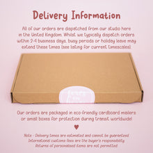 a cardboard box with a sticker that says delivery information
