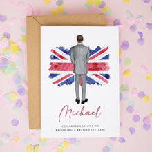 a greeting card with a man standing in front of a Union Jack flag, surrounded by confetti. The card is addressed to "Michael" and congratulates him on becoming a British citizen.